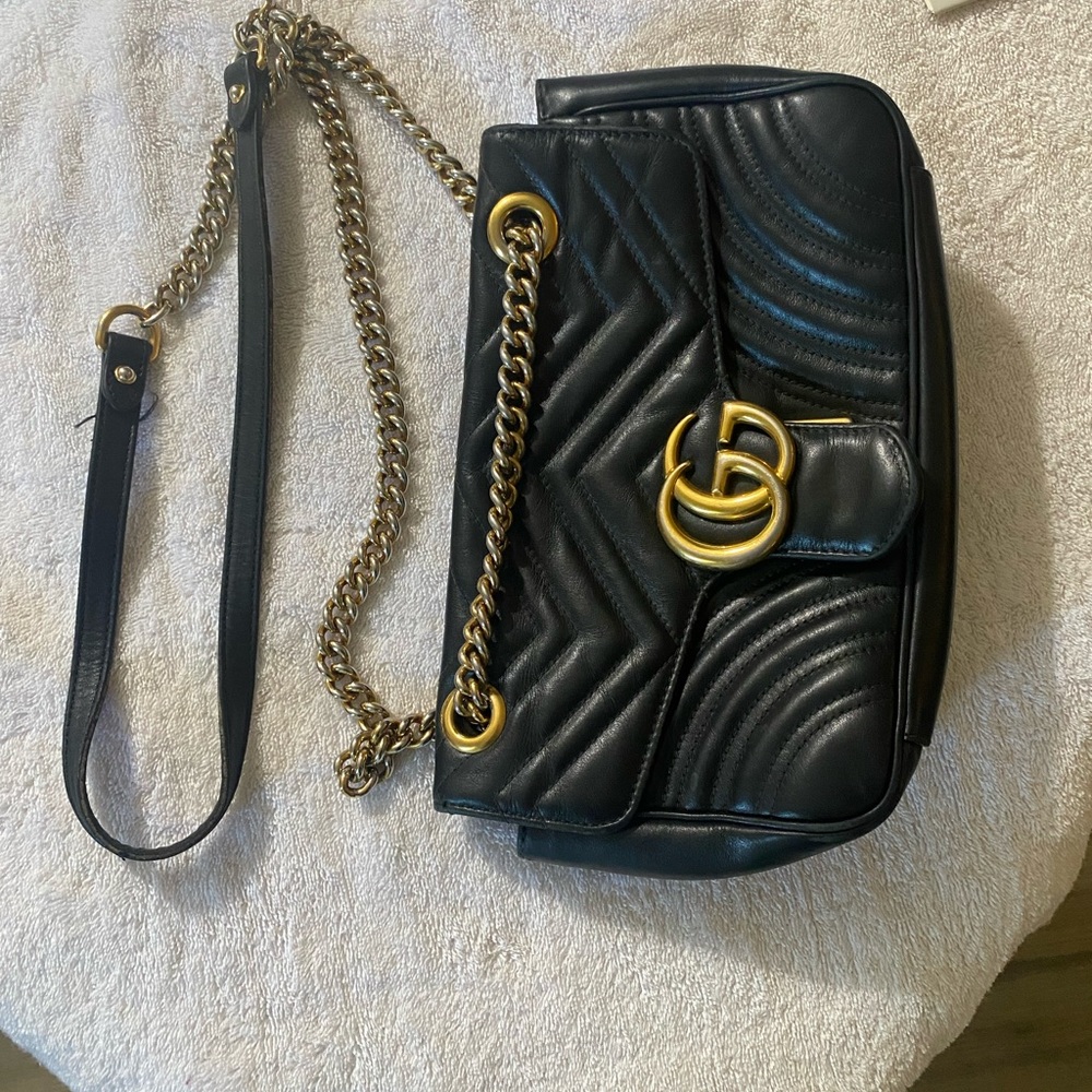 Gucci Black Leather Bag with Gold Accents